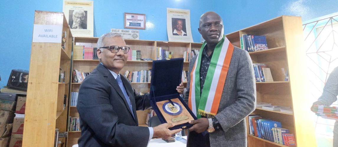 Director General, D. Nelson Bearngar (right) and India Ambassador Manoj Bihari Verma.